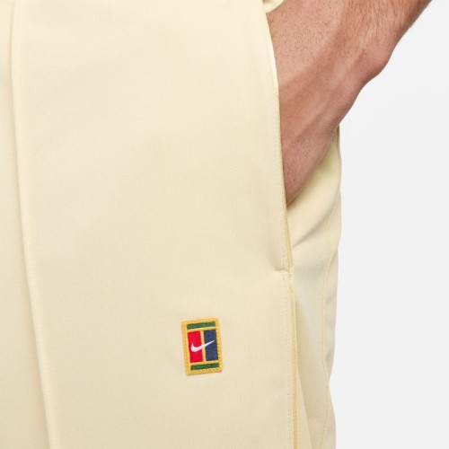 Men's trousers Nike Court Heritage Suit Pant - team gold Men's trousers Nike Court Heritage Suit Pant - team gold